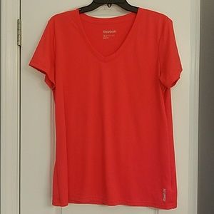 Dry fit Reebok shirt.